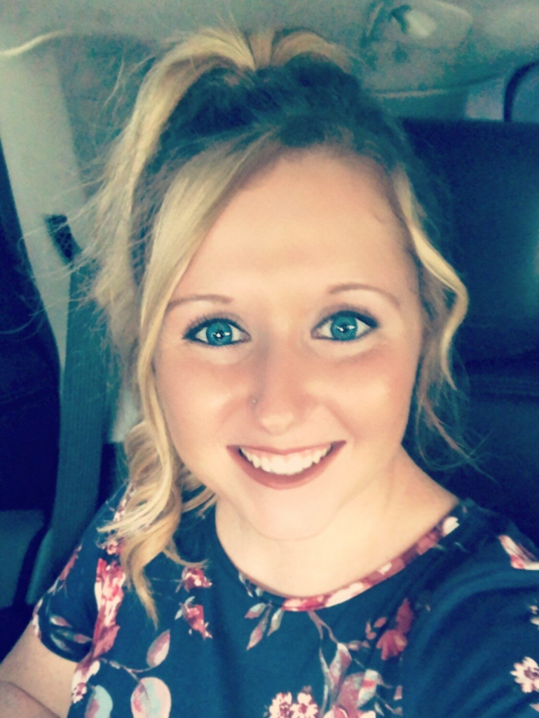 Selfie of Kelsey Torres smiling at the camera.